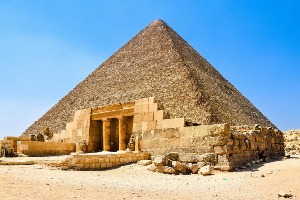 Stunning wide-angle view of the Great Pyramid of Giza, showcasing ancient architectural brilliance.